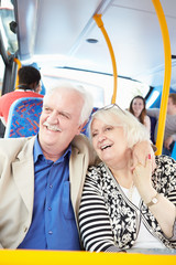 Wall Mural - Senior Couple Enjoying Journey On Bus