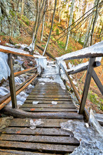 Icy Wooden Bridge In Winter