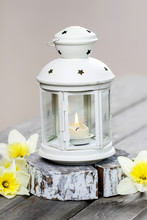 Beautiful White Lantern With Burning Candle Inside