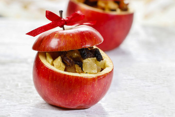 Sticker - Red christmas apples stuffed with dried fruits in honey on white