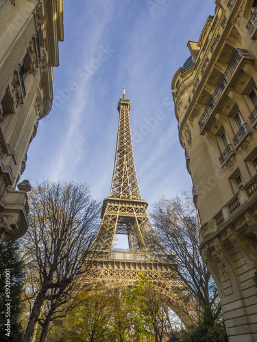 Naklejka na drzwi The Eiffel tower is one of the most recognizable landmarks in th