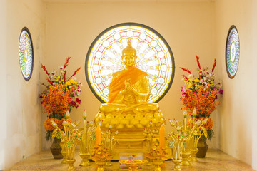 golden buddha statue in peace