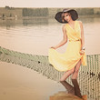 © Evgenia Tiplyashina - A girl stands in the water