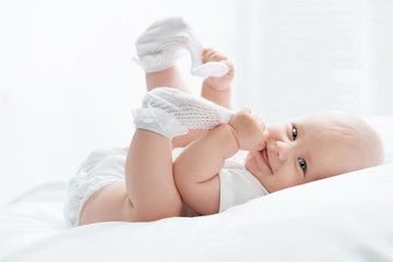 Wall Mural - Portrait of a happy young child