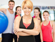 © Syda Productions - group of smiling people exercising in the gym