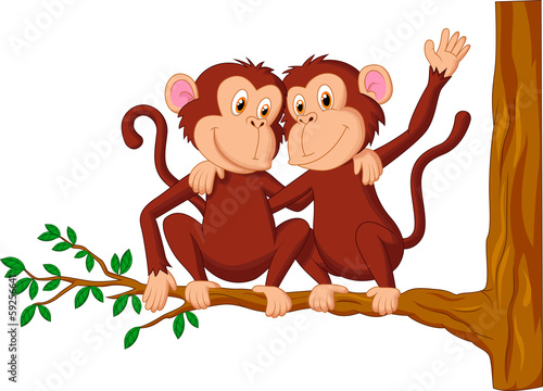 Fototapeta na wymiar Two monkeys sitting on a tree
