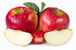red ripe apples with green leaf and cut from the inside on a white background