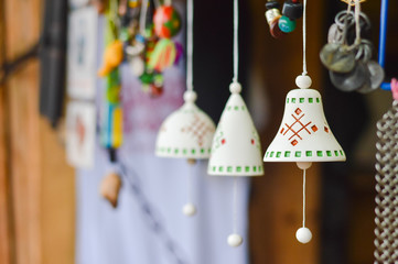 Handmade traditional ceramic jingle bells with ethnic ornament