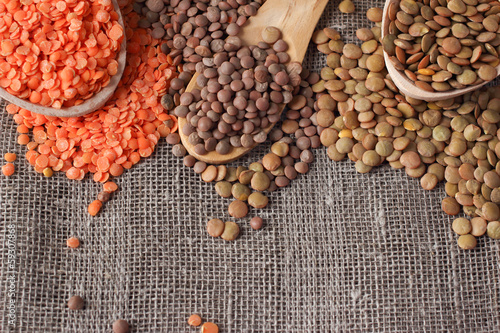 VARIOUS TYPES OF LENTILS. Lentils on linen sackcloth
