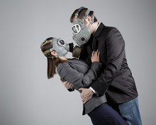 Couple In Love In Gas Masks