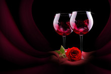 Glass Of Wine With Red Silk And Flower