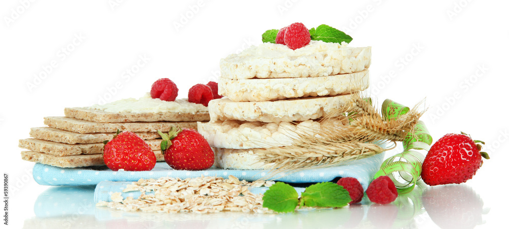 Tasty crispbread with berries, isolated on white