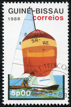 Stamp Printed In Guinea-Bissau Shows Sailing Boat