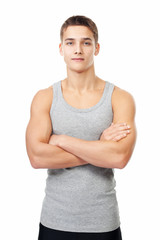 Wall Mural - Young muscular athlete man