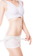 © julenochek - Slimming woman measuring hip with tape