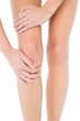 © lightwavemedia - Close-up mid section of a young woman with knee pain