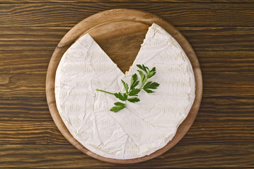 camembert cheese slice macro shot. Shallow DOF