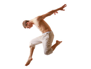 Young man jumping high on isolated white background