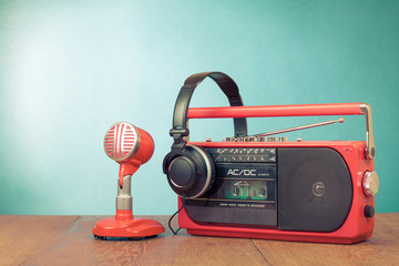 Poster - Retro red radio cassette player, microphone, headphones on table