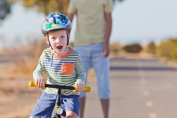 Canvas Print - little boy biking