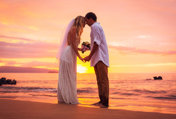 Wall Mural - Bride and Groom, Enjoying Amazing Sunset on a Beautiful Tropical
