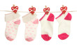 © Africa Studio - Socks hanging on clothesline isolated on white
