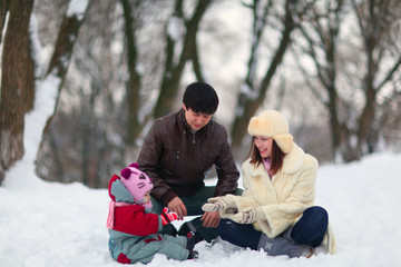  Happy family having fun on beautiful snowy