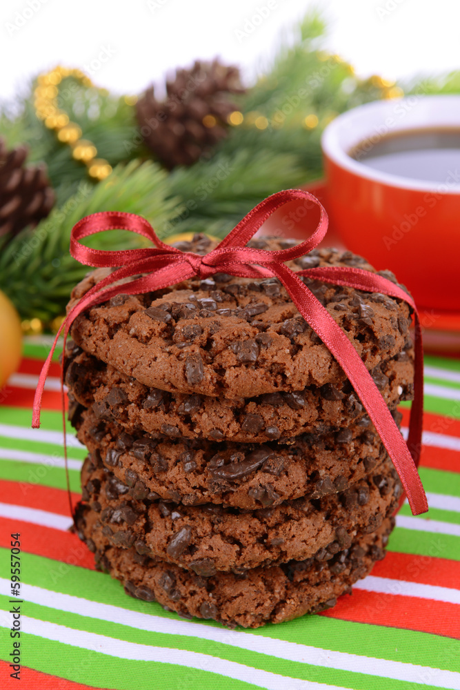 Sweet cookies with cup of tea on table close-up