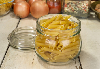 italian pasta (macaroni)  in glass jar