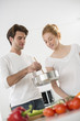 © jackfrog - couple in the kitchen cooking vegetables