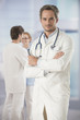 © jackfrog - portrait of a doctor arms crossed in hospital