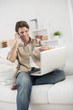 © jackfrog - man at phone paying online ordering