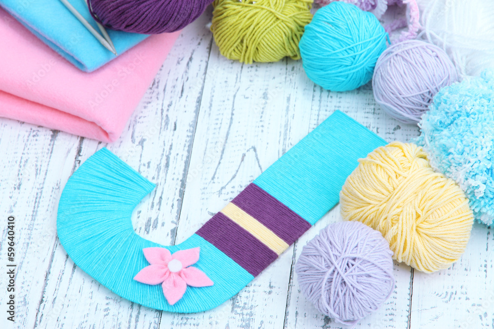 One letter of knit handmade alphabet close up