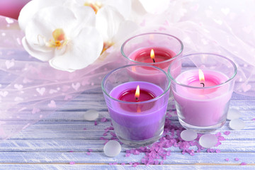 Poster - Beautiful colorful candles and  orchid flowers,