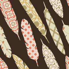 vector seamless pattern with patch ornate colorful feathers