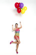 © ikostudio - Fashion woman with ballons