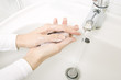 © kalcutta - woman washing hands with soap