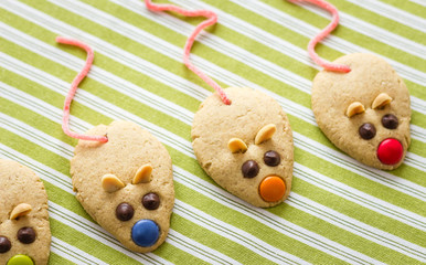 Wall Mural - Cookies with mouse shaped and red licorice tail