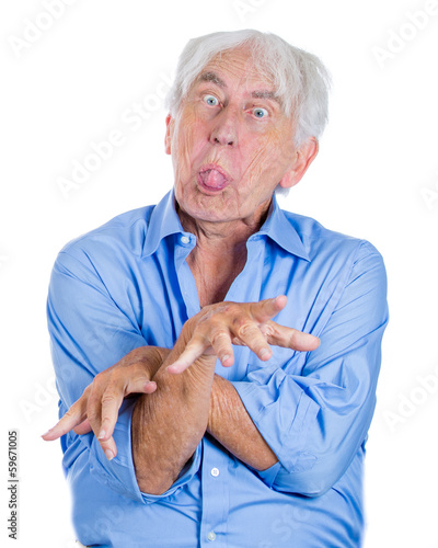 Crazy, agitated, unhinged, old man sticking tongue out - Buy this stock
