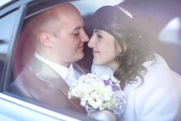 Wall Mural - bride and groom in the car