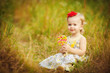 © GTeam - happy little girl licks sweet candy nature summer outdoor