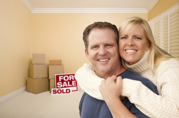 Wall Mural - Couple in New House with Boxes and Sold Sale Sign