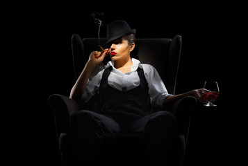 Mafiosi woman with cigar and brandy glass