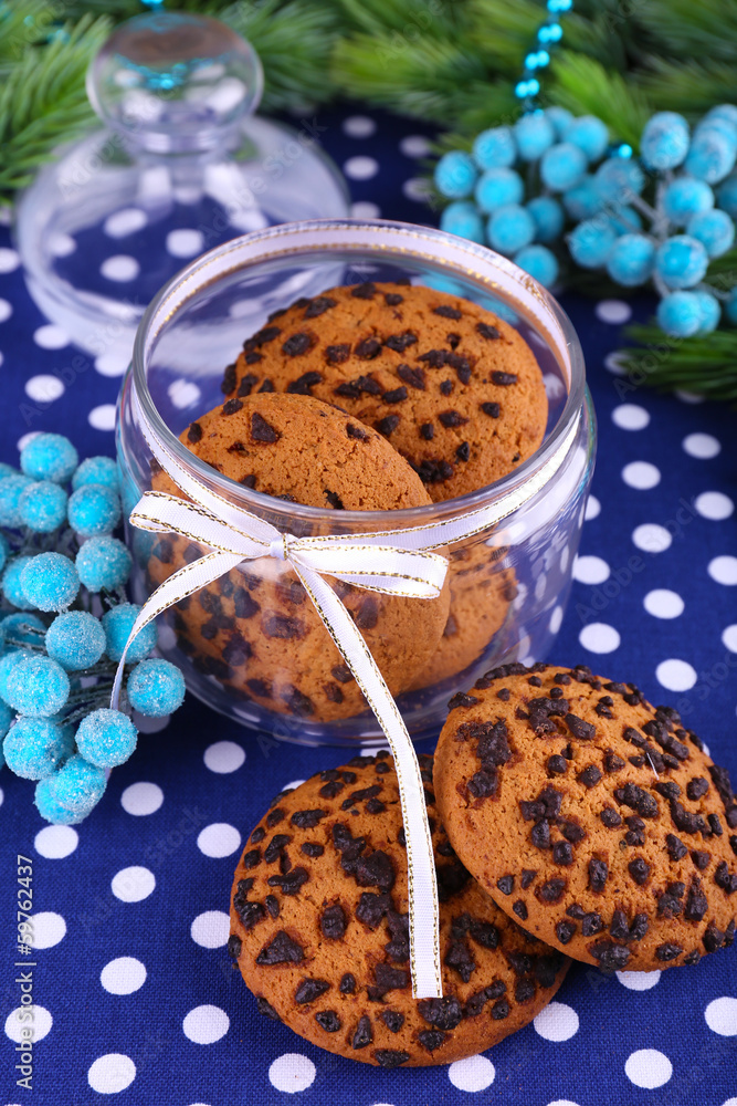 Delicious Christmas cookies in jar on table close-up