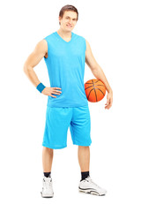 Canvas Print - Full length portrait of a male basketball player holding a ball