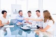 © WavebreakMediaMicro - Executives shaking hands during a business meeting