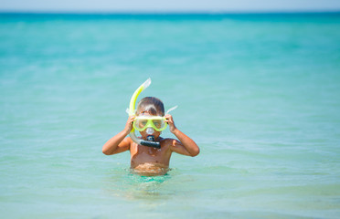 Wall Mural - Happy boy on beach