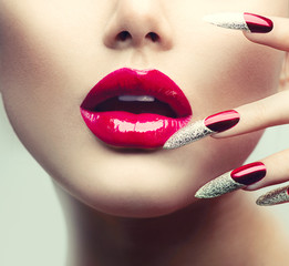 Poster - makeup and manicure. red long nails and red glossy lips