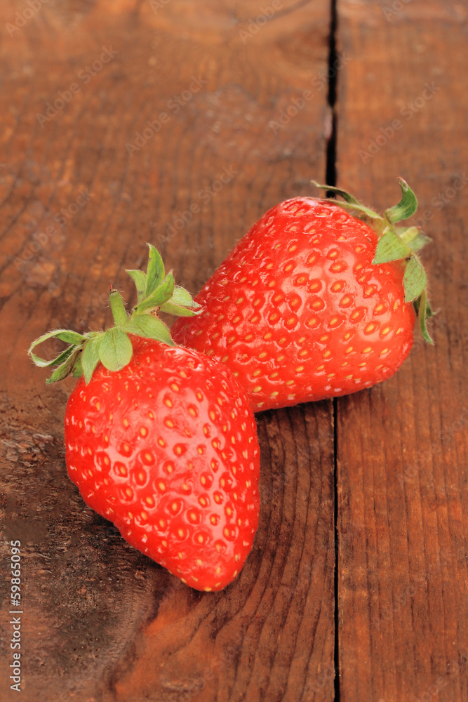 Fresh strawberry on wooden background