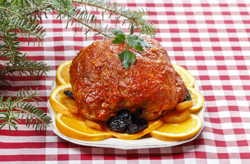 Canvas Print - Pork served on oranges and plums. Festive dinner